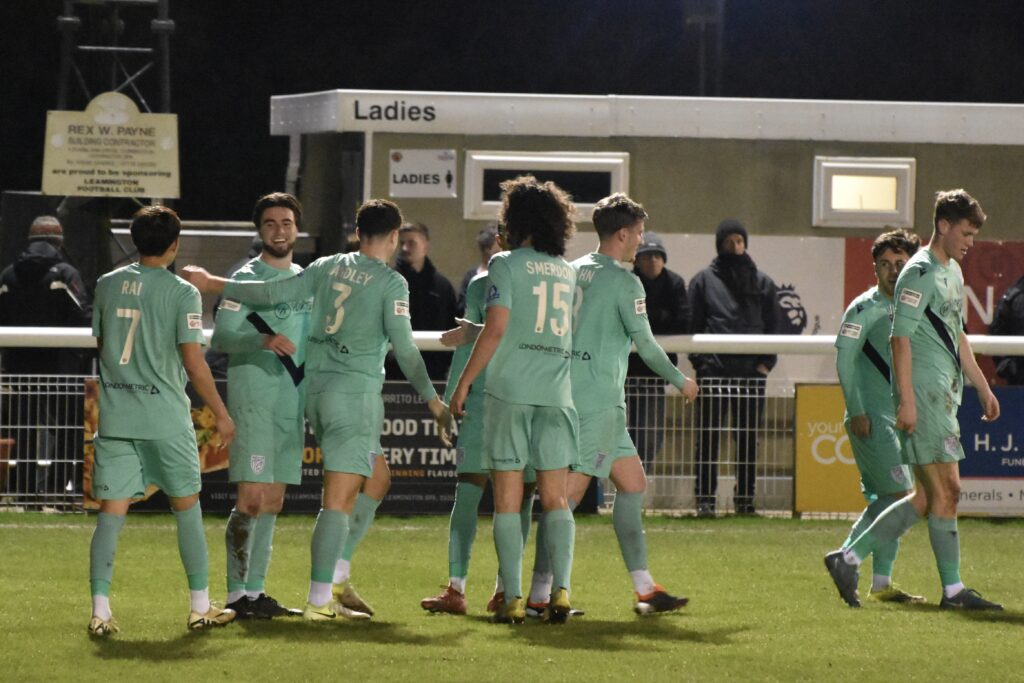 Calum Ryan-Phillips celebrates his goal and Merthyr Town second